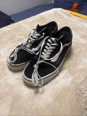 Vans - Classic Black Low-Top Skate Sneakers with White Accents